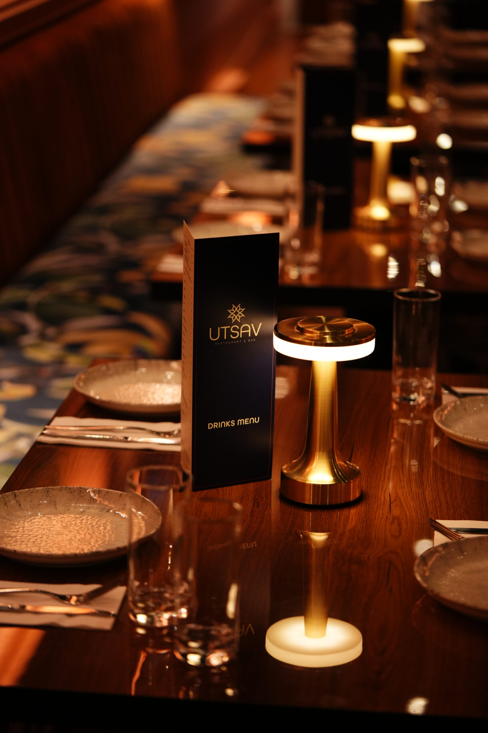 Utsav table setting by the window at night